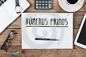 Spanish Text numeros primos prime numbers on note pad at offic photo